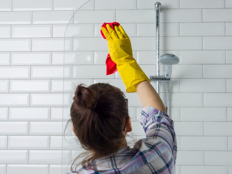 house-cleaning-woman-is-cleaning-bathroom-home
